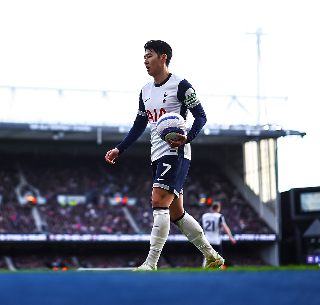 Son Heung-min carries the new Premier League match ball, with a minimalist circular design.