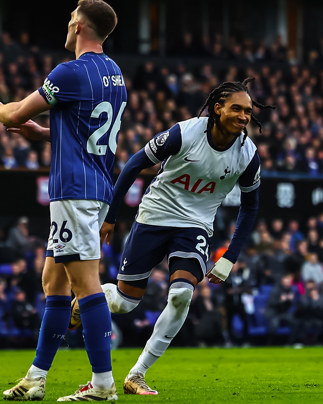 Djed Spence smiles after scoring his first PL goal.