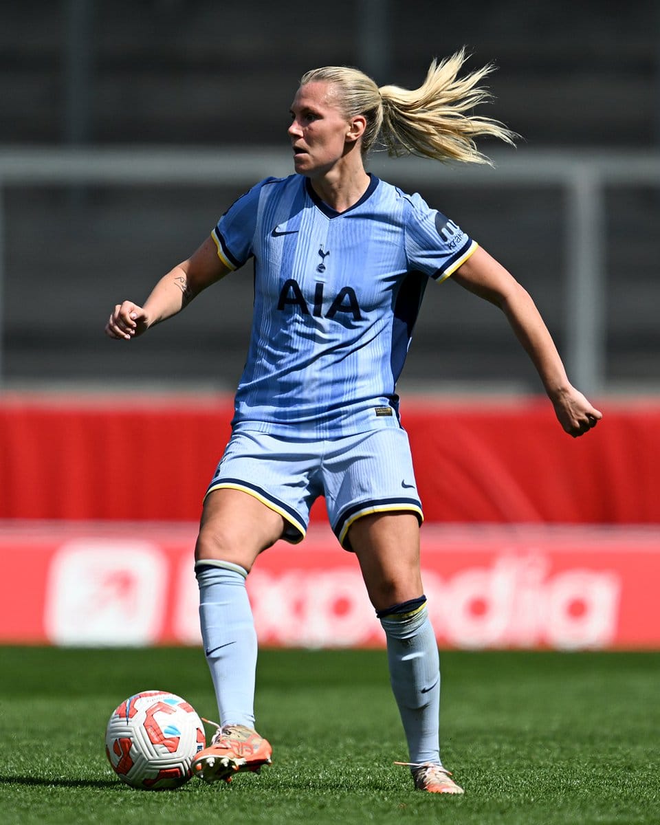 Josefine Rybrink prepares to move the ball as she assesses the pitch.