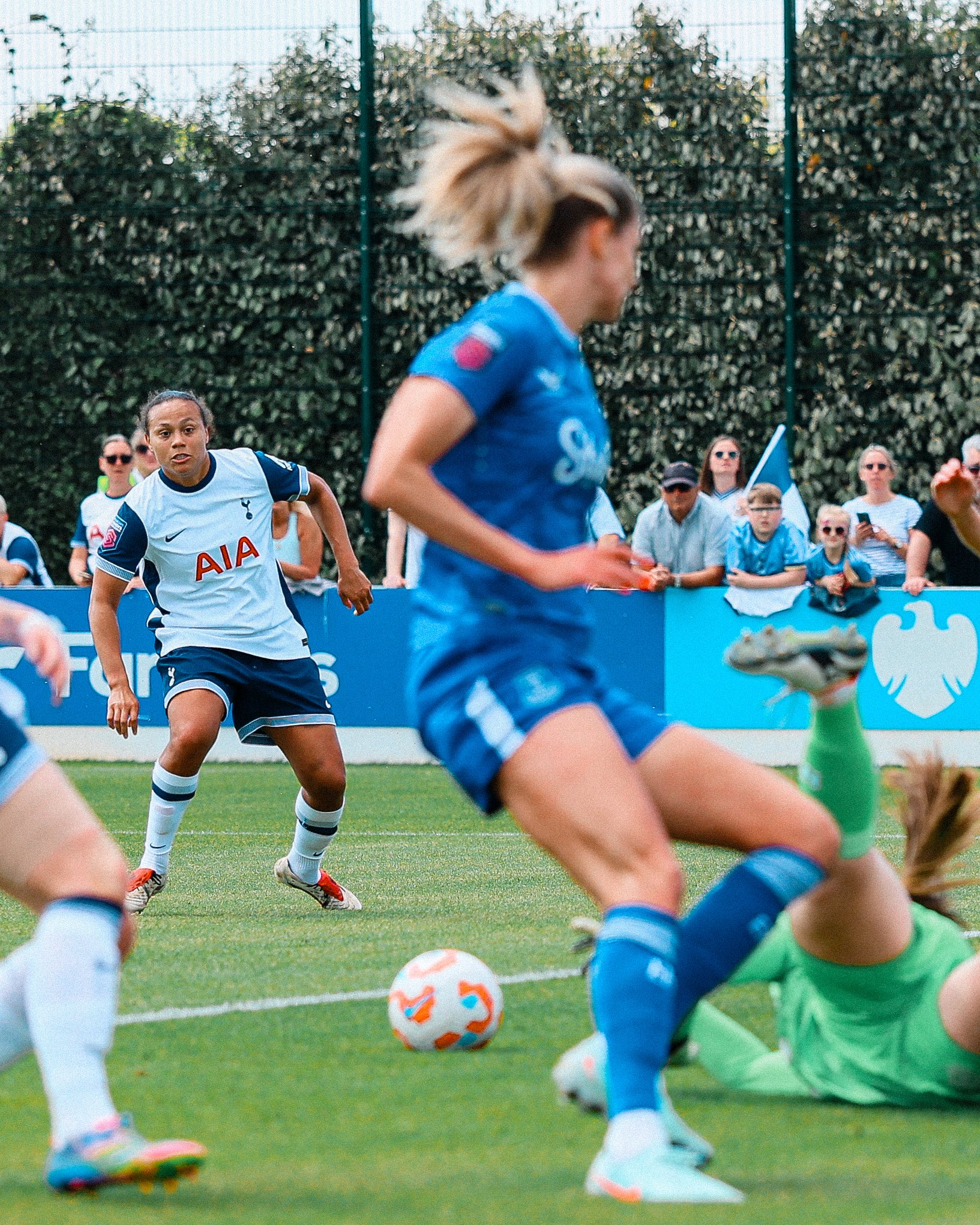 Drew Spence watches her shot on the way to the goal.