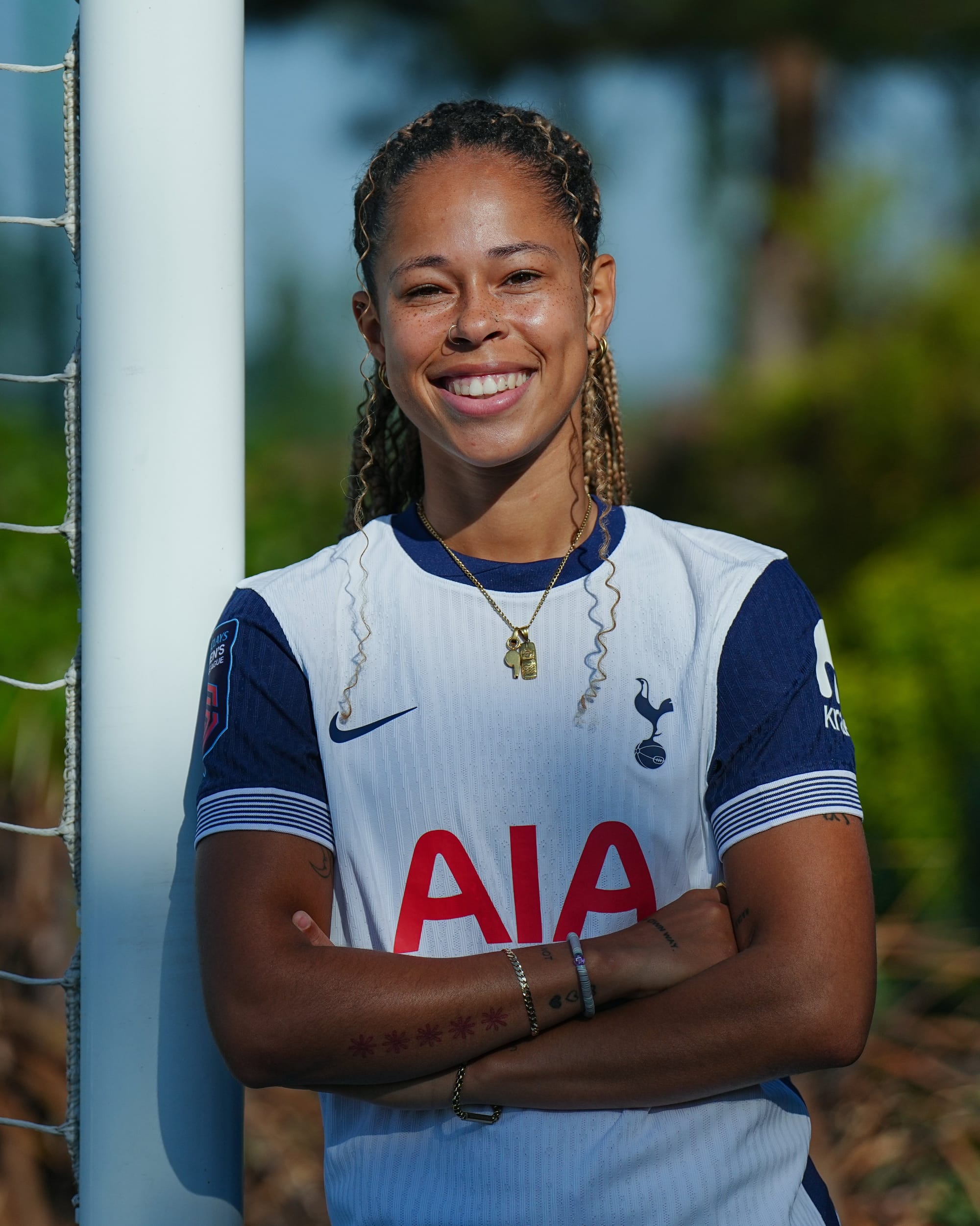 Lenna Gunning-Williams poses against the goal post after signing her new contract.