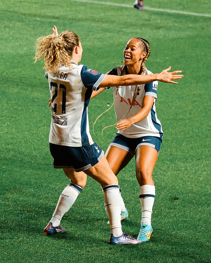 Luana Bühler runs to hug Lenna Gunning-Williams to celebrate the former's first Spurs goal.