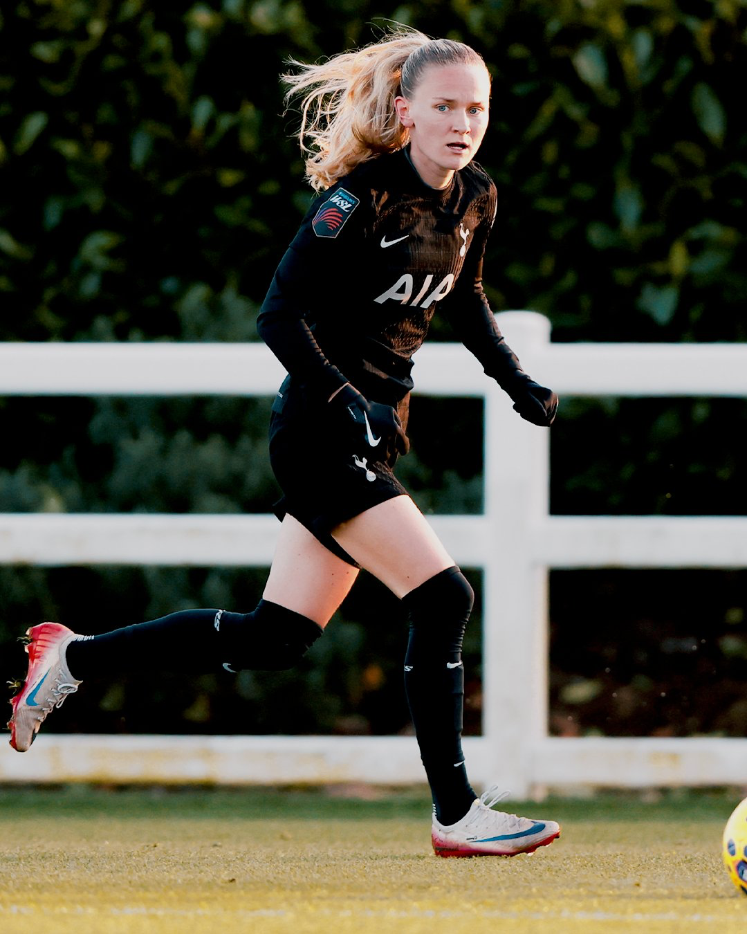 Matilda Vinberg dribbles as she scans the pitch.