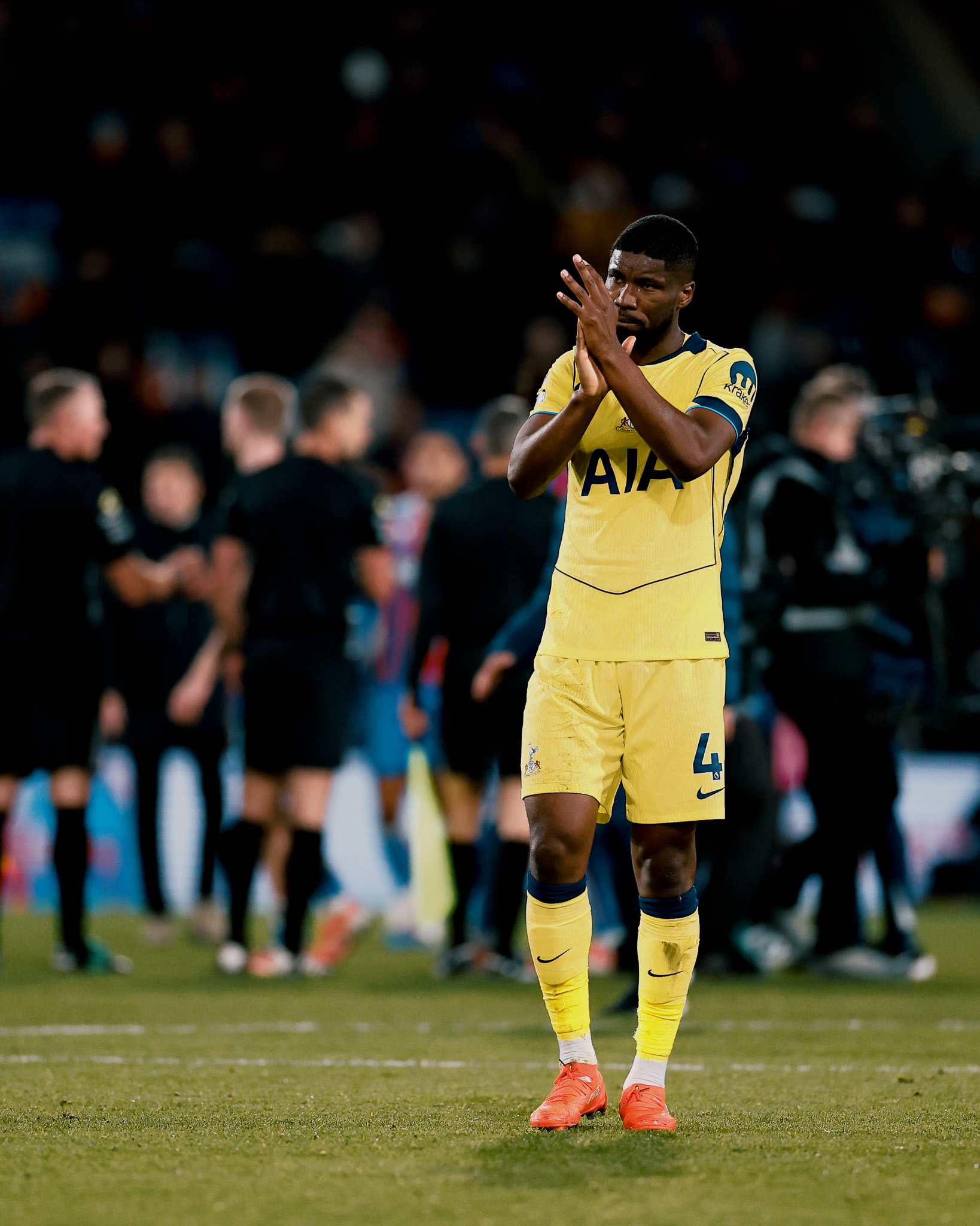 Kevin Danso claps the fans after the game.