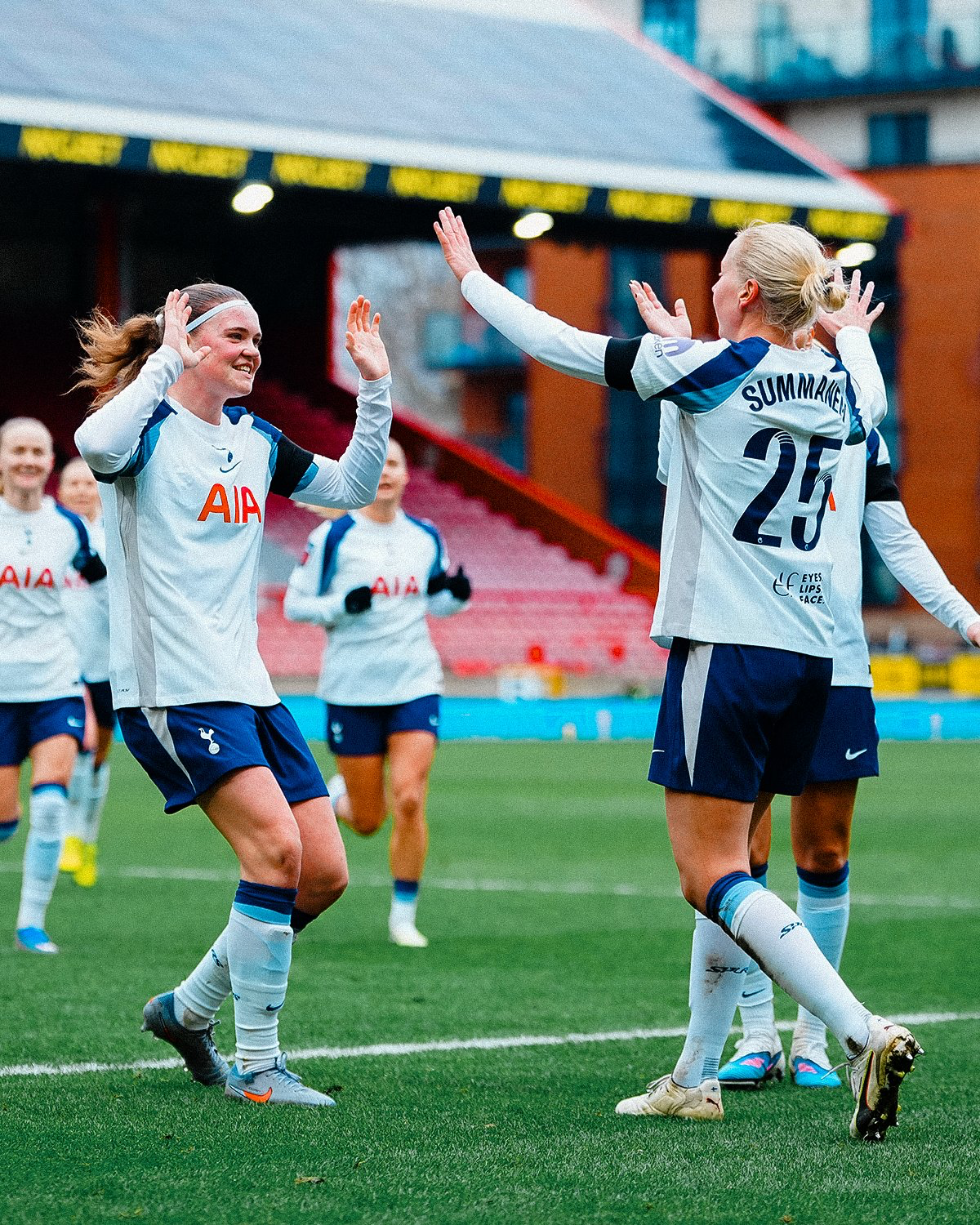 Signe Gaupset and Eveliina Summanen prepare to high five. 