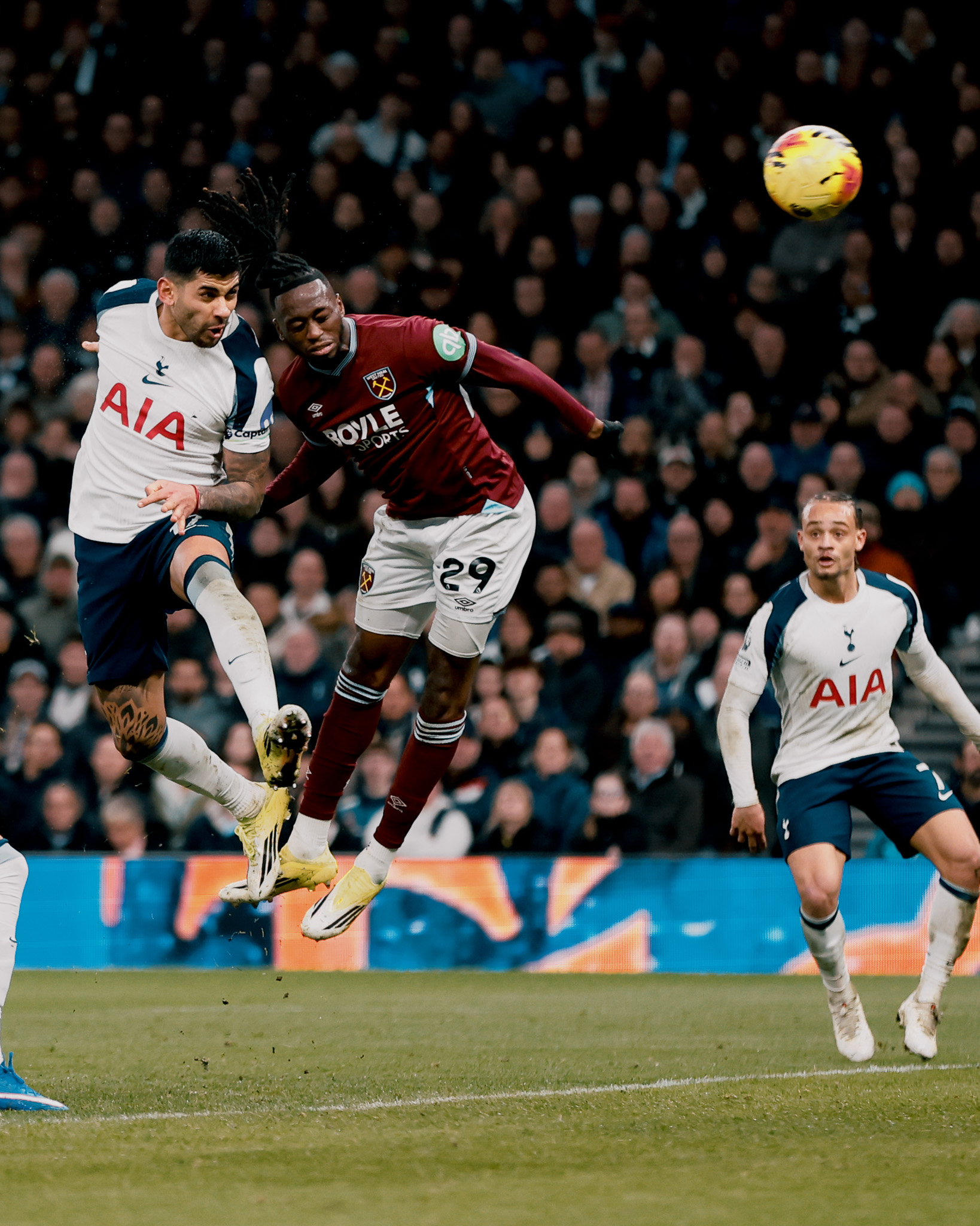 Cristian Romero heads in a goal over Aaron Wan-Bissaka.
