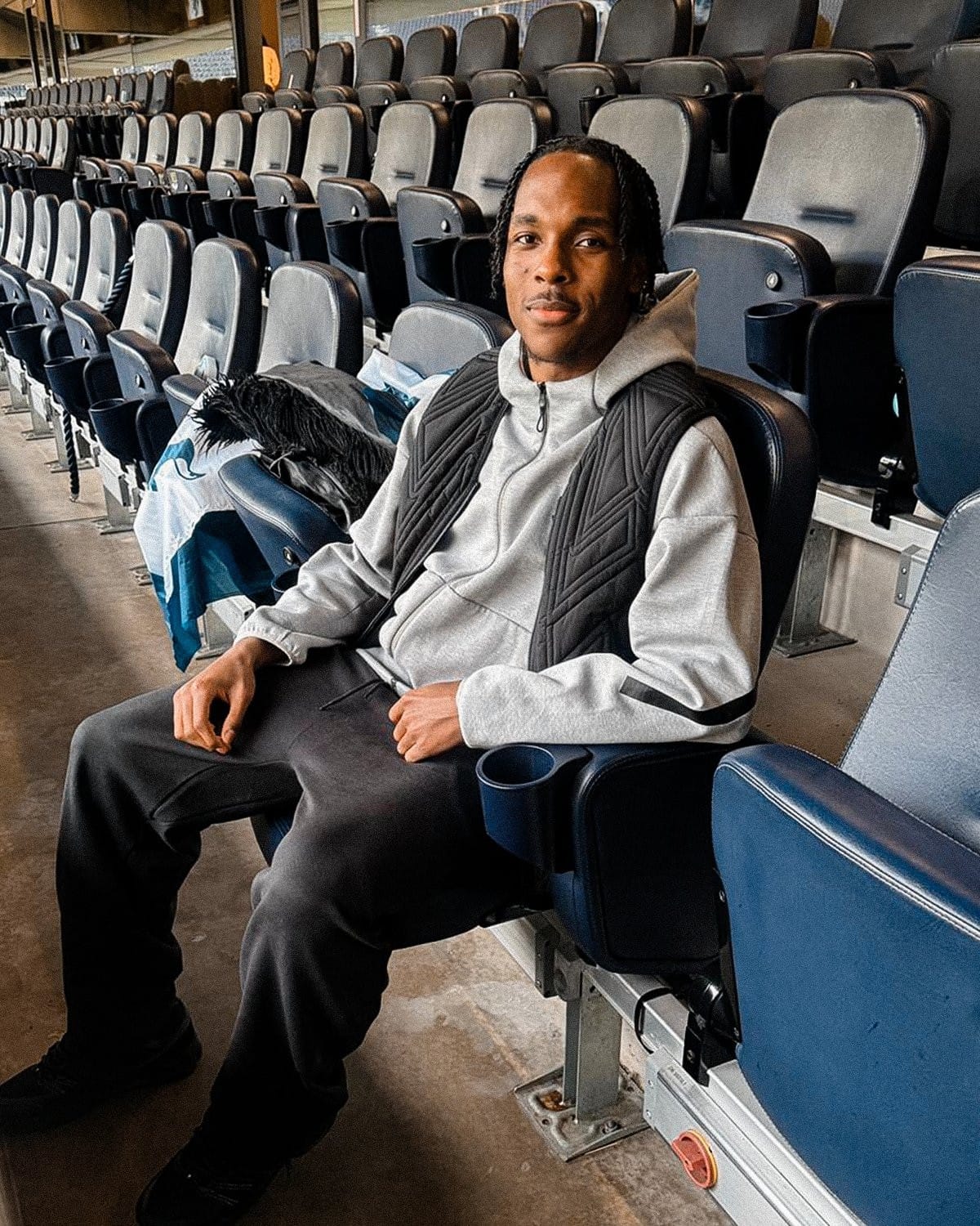 Mathys Tel posing in the stands at THS.