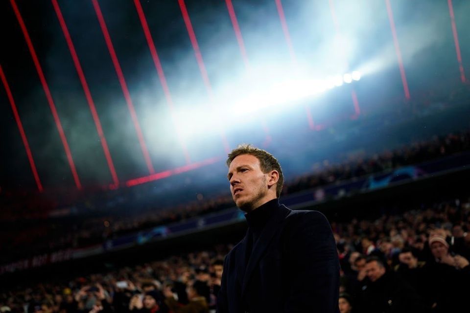 Julian Nagelsmann stands on the touchline in a black turtleneck.