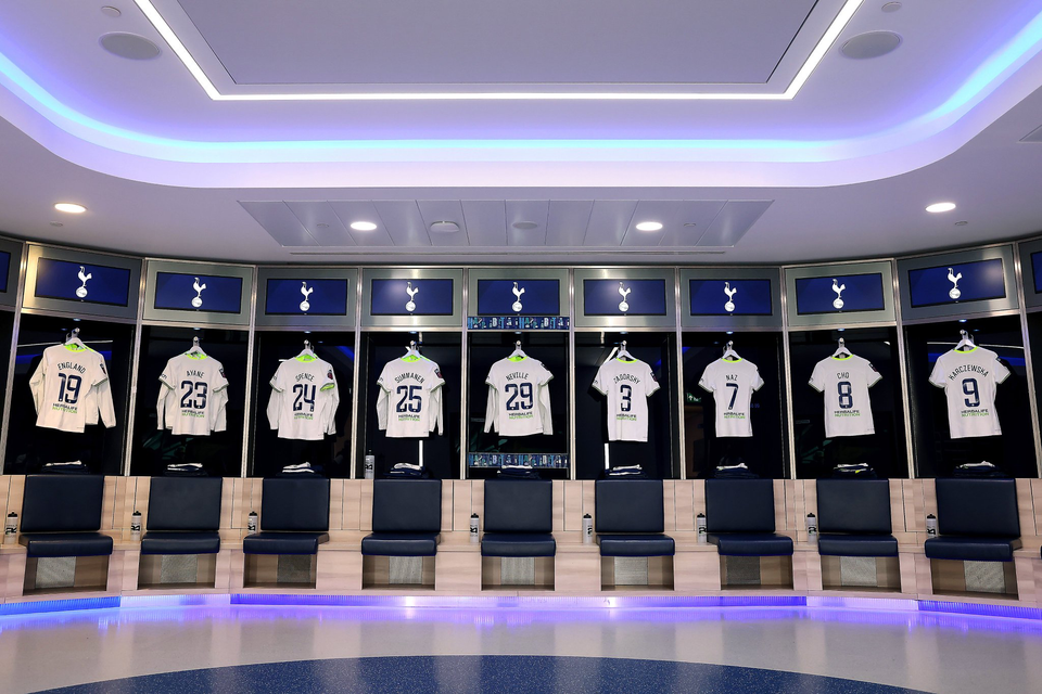 Kits for the Women's team hang in the dressing room at Tottenham Hotspur Stadium.