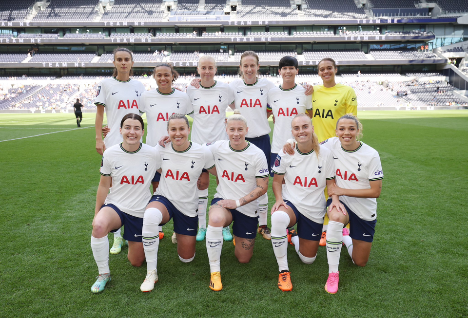 The starting XI for the match against Reading lines up for a team photo.