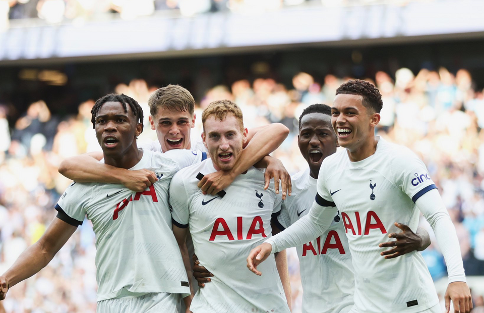 Several members of the Men's team celebrate at the end of the comeback win against Sheffield United.