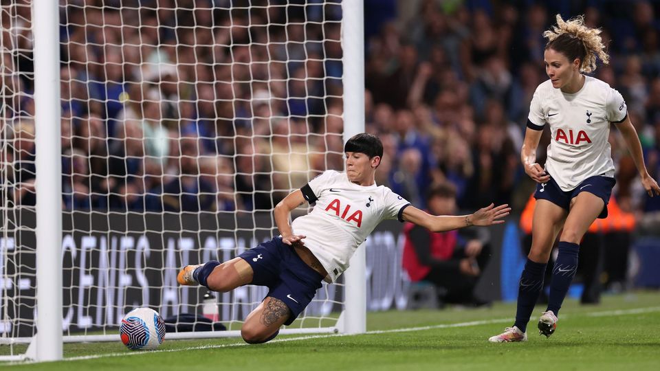 Ash Neville attempts to clear the ball off the line during the game at Chelsea.