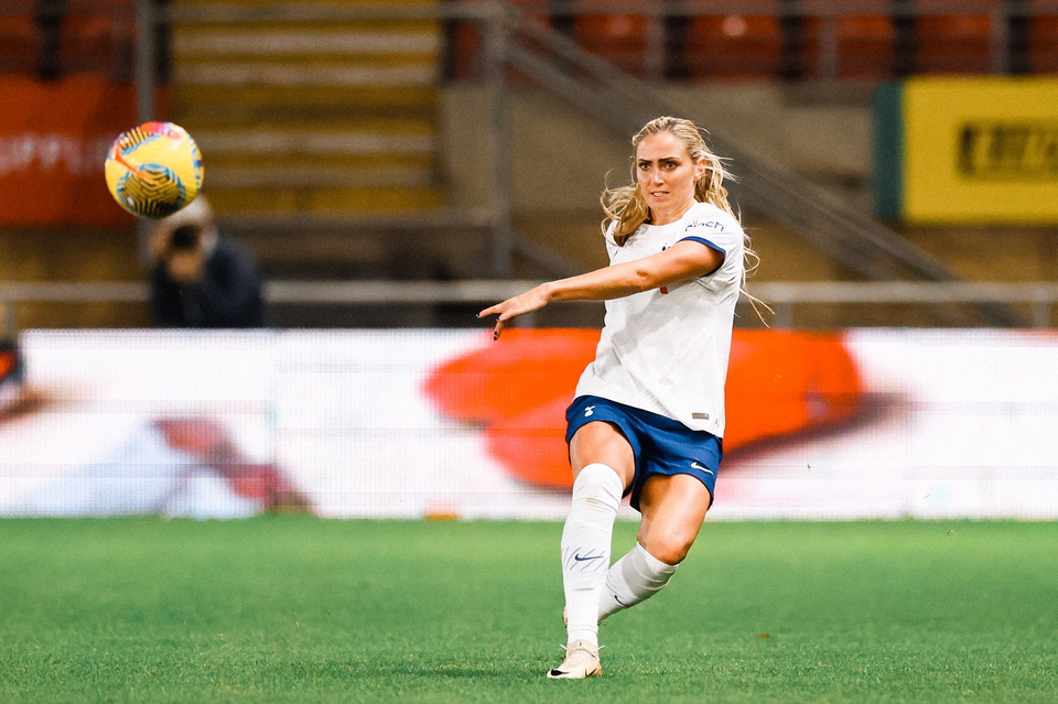 Shelina Zadorsky winds up for a long range pass.