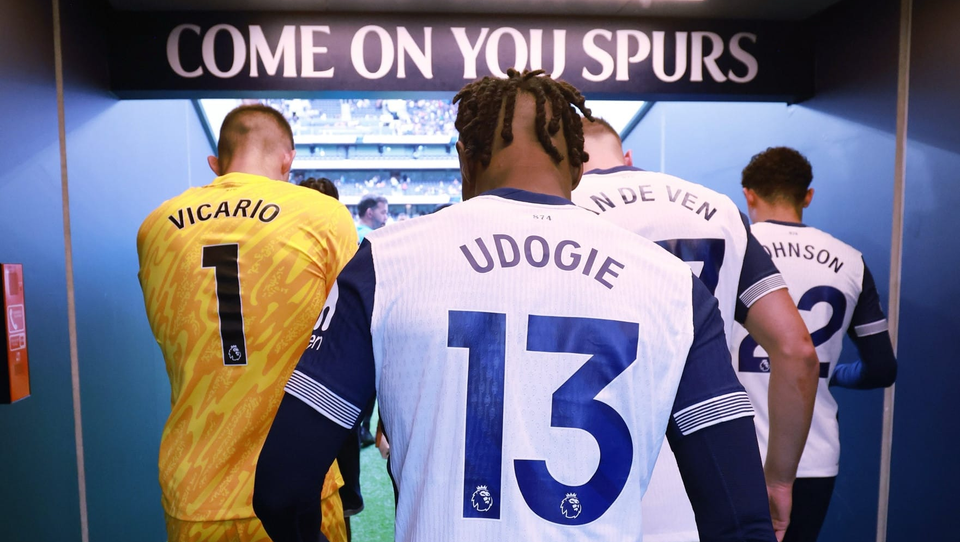 Vicario, Udogie, Van de Ven, and Johnson enter the pitch under the "Come on your Spurs" sign in the tunnel.