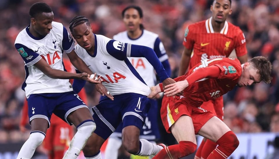 Pape Sarr and Mathys Tel grapple with Liverpool's Conor Bradley.