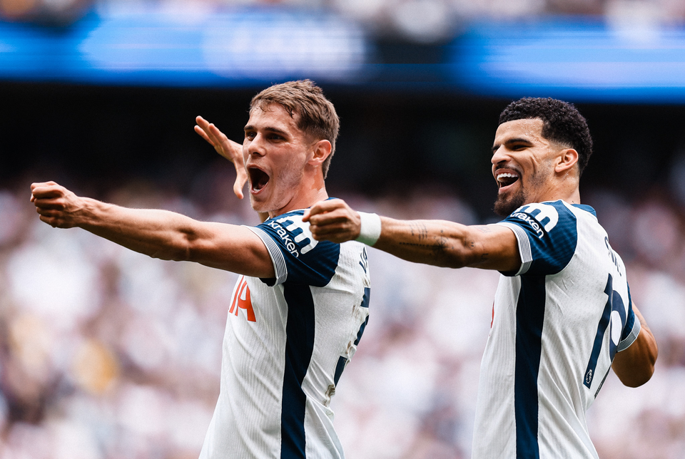 Micky van de Ven joins Dominic Solanke in his bow and arrow goal celebration.
