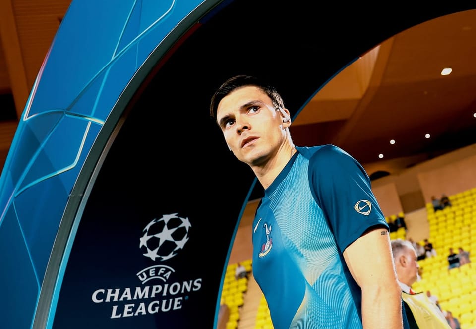 João Palhinha walks under the Champions League archway.