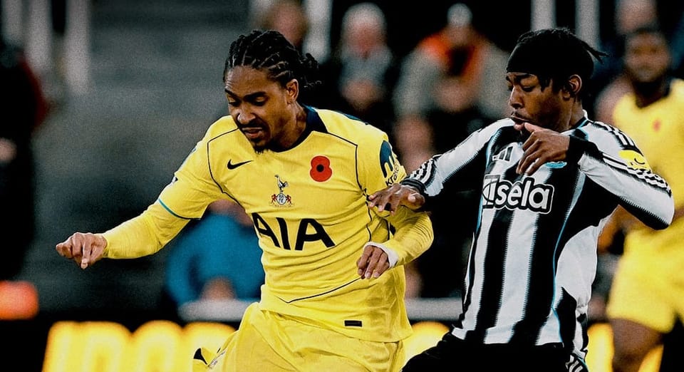 Djed Spence challenges Anthony Elanga for the ball.