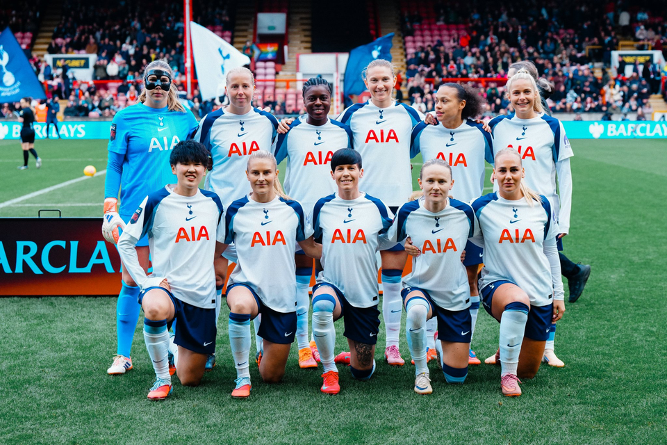 The starting XI poses for a team photo before the NLD.